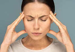 Woman suffering from headache